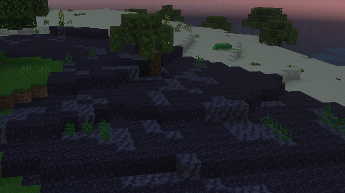 Pixelated landscape with dark terrain.