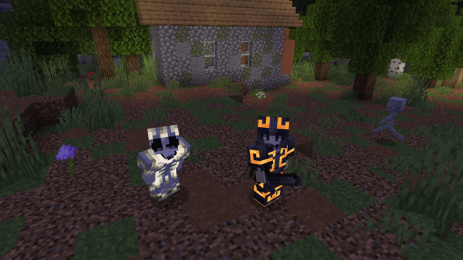 Two characters in glowing armor.