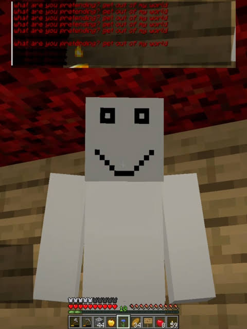 Blocky white figure with unsettling smile