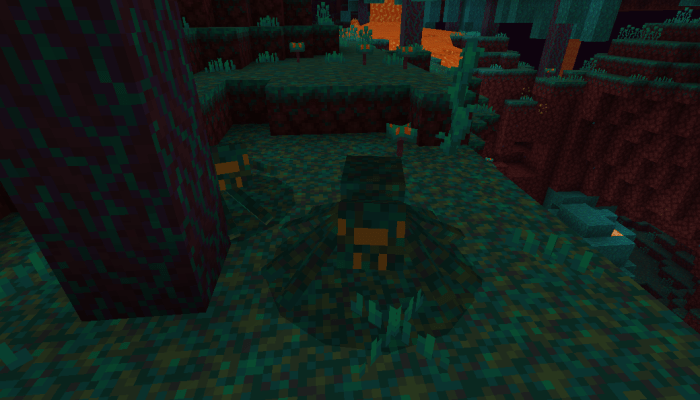 Pixelated spiders on a blocky terrain.