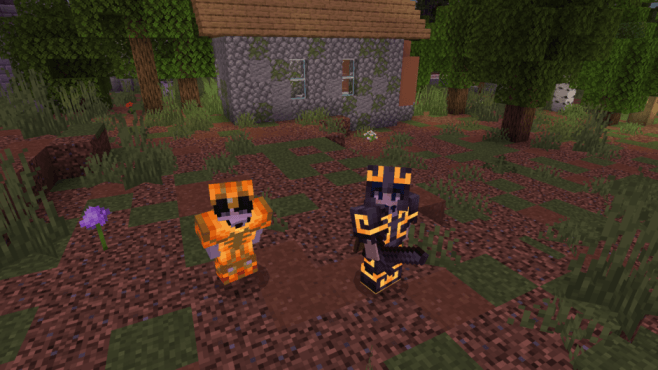 Two characters in glowing armor.