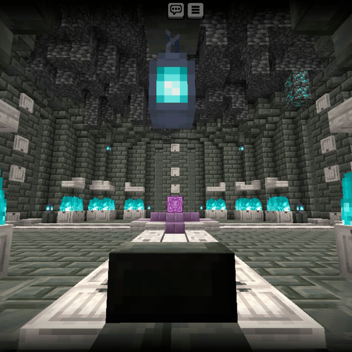 Dark stone chamber with glowing blue lanterns
