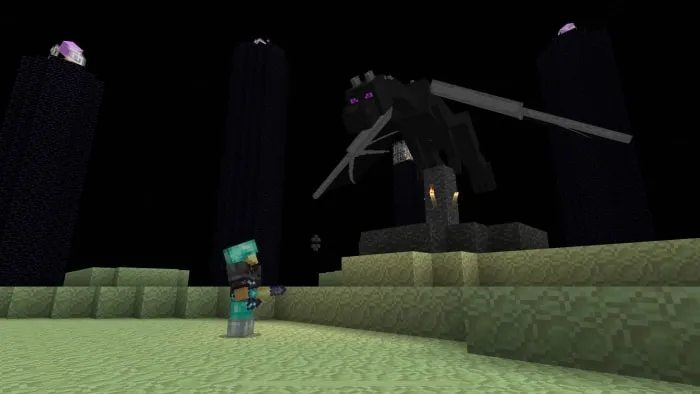 Player faces dragon atop obsidian pillars.