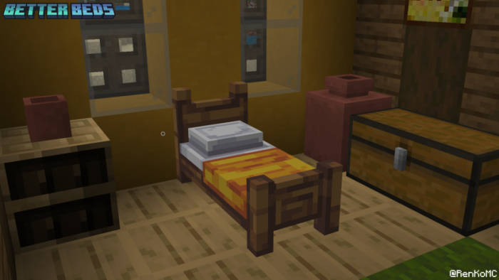 Wooden bed with colorful bedding.