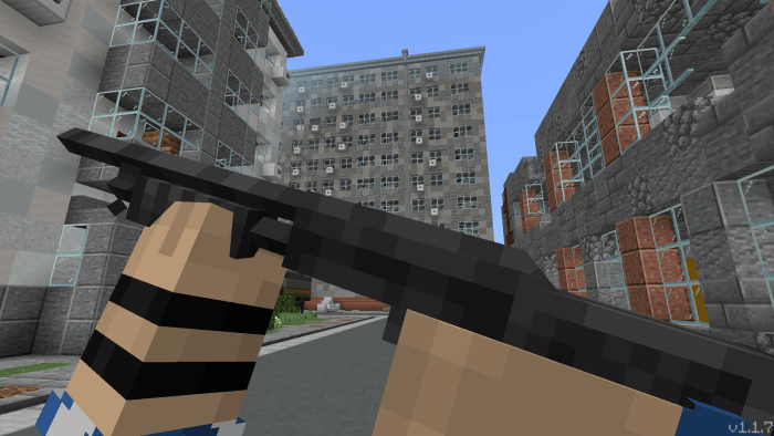Pixelated shotgun held in a city street