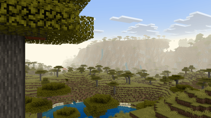Soft atmospheric fog over blocky savanna hills