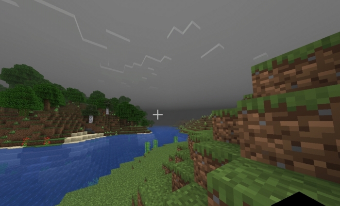 Foggy landscape with dark sky.
