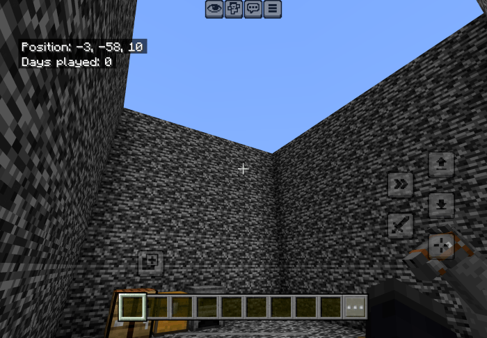 Stone-walled puzzle room with open sky.