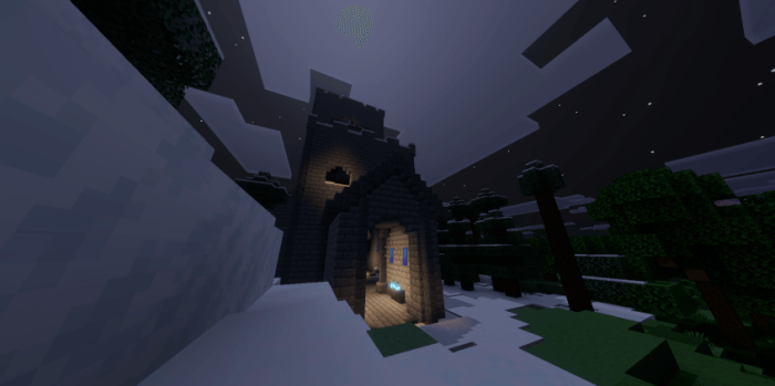 A snowy fortress under moonlight.