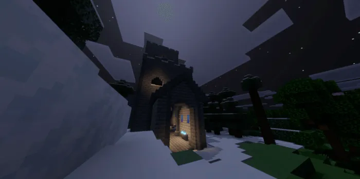 A snowy fortress under moonlight.