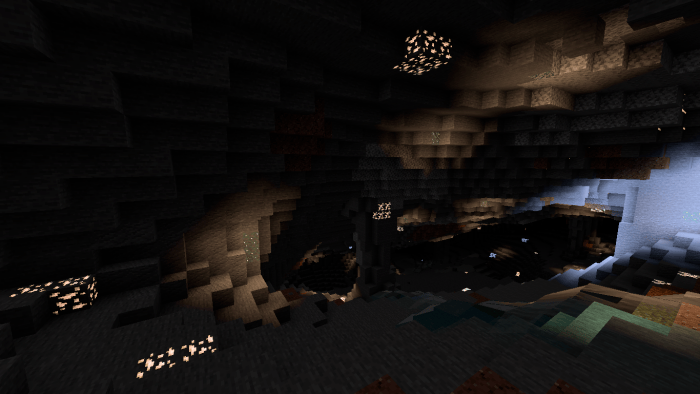 Glowing ores in a dark cave environment.