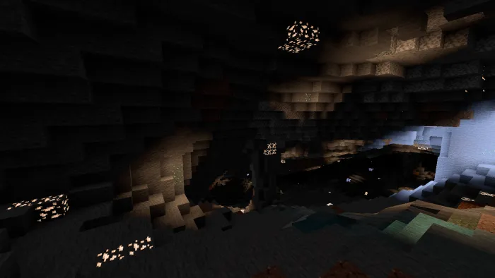 Glowing ores in a dark cave environment.