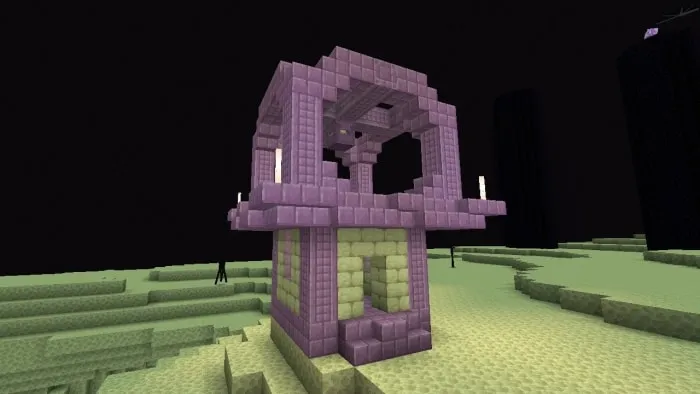Purple ruin structure in a barren landscape.
