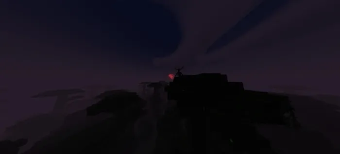 Dark silhouette of a creature on a hilltop