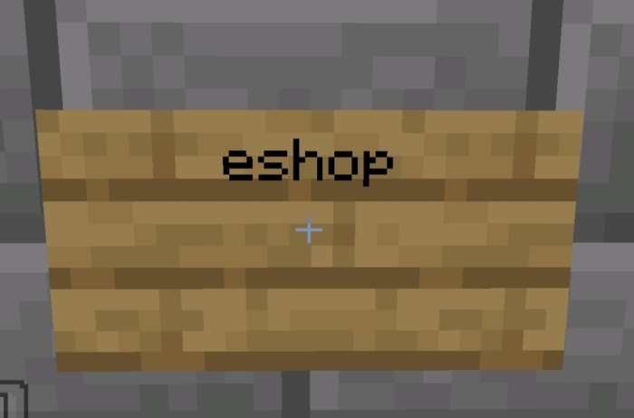 Wooden sign with eshop written on it.