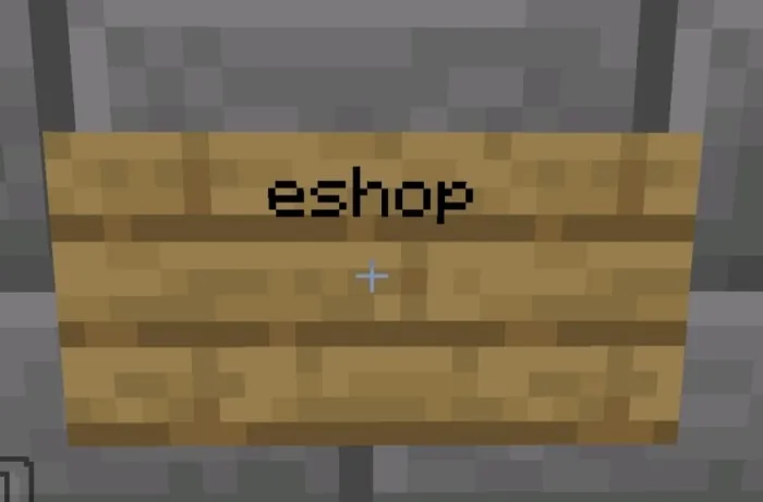 Wooden sign with eshop written on it.