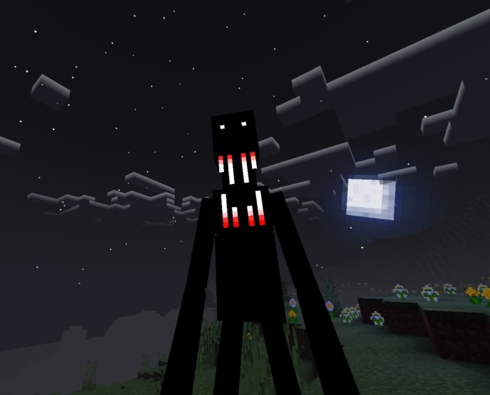Tall, eerie entity under moonlit sky.