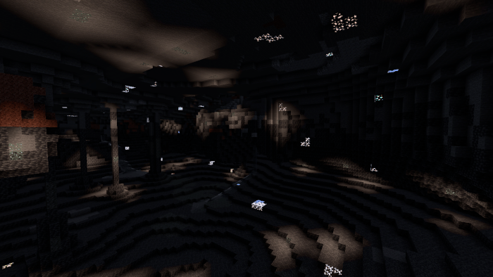 Glowing ores in a dark cave.