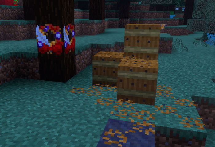 Barrels and foliage in a forest scene.