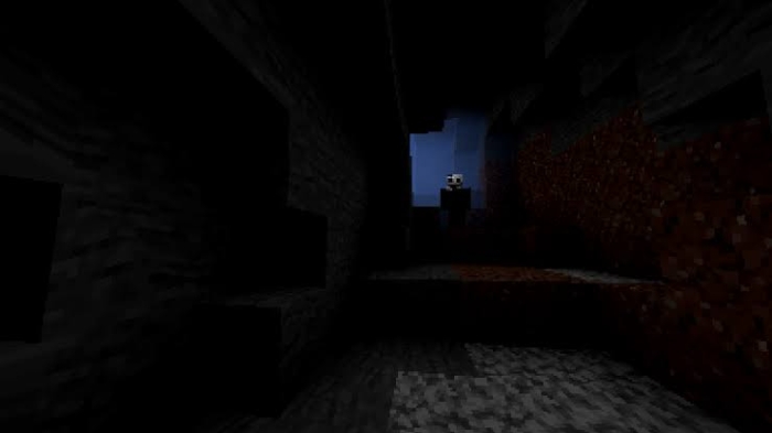 Dark cave with a mysterious figure.