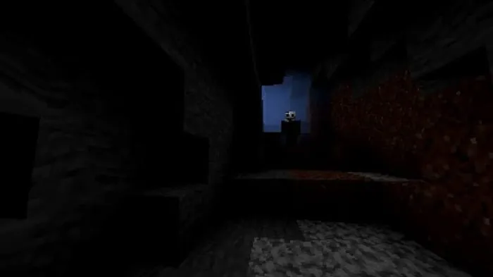 Dark cave with a mysterious figure.