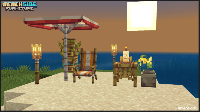 Beach scene with umbrella and chairs.