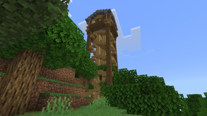 Wooden tower in a forest.