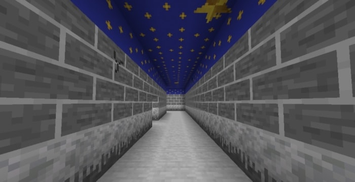 Gray brick hallway with blue star ceiling