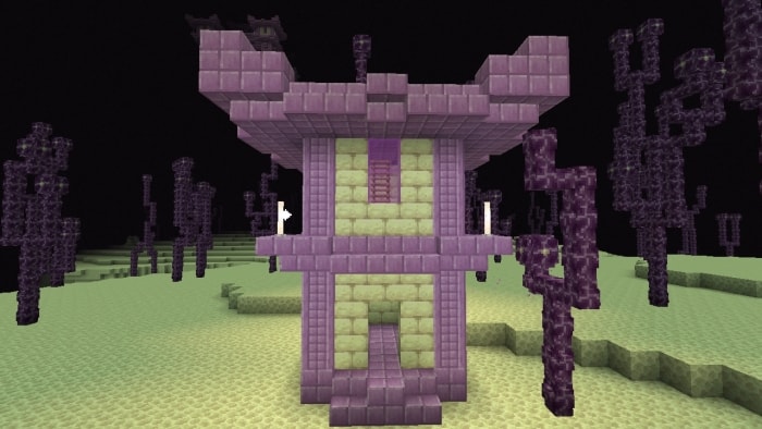 Purple ruin structure in a barren landscape.