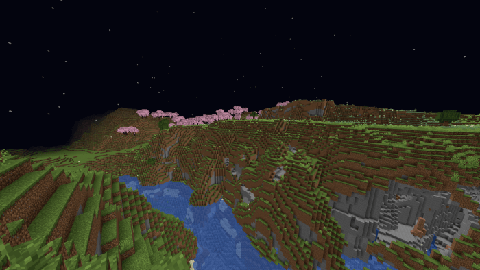 Night vision view of a blocky landscape.