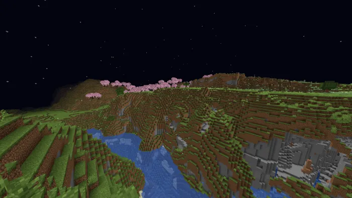 Night vision view of a blocky landscape.
