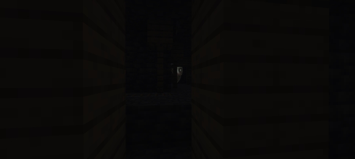 Creepy face lurking in a dark hallway