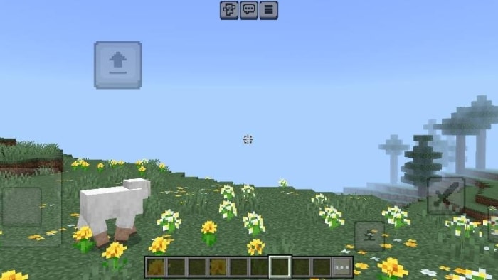 Small crosshair over field with sheep and flowers
