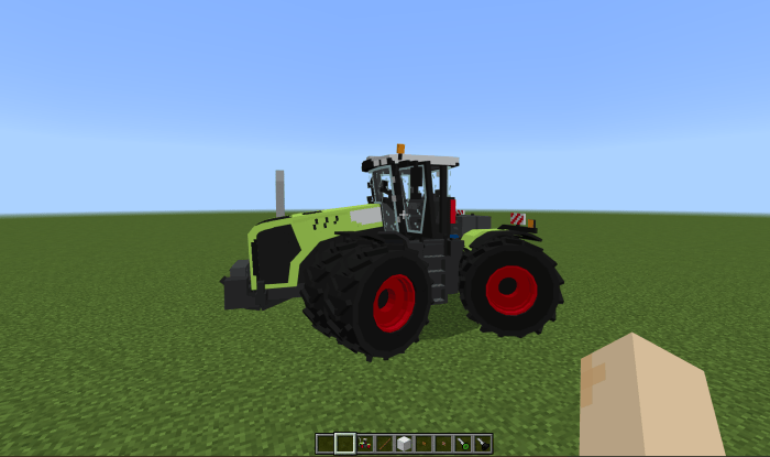 Tractor in a grassy field.
