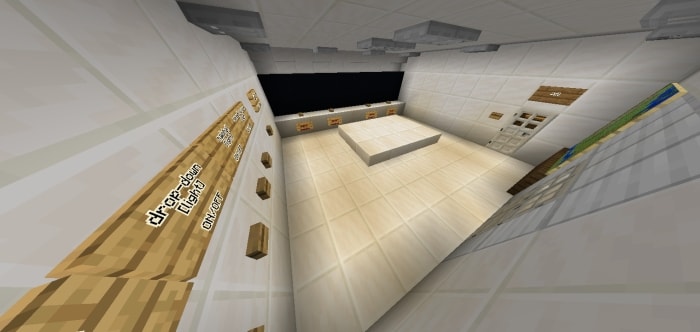 White bunker lobby with signs and buttons