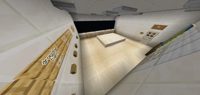 White bunker lobby with signs and buttons