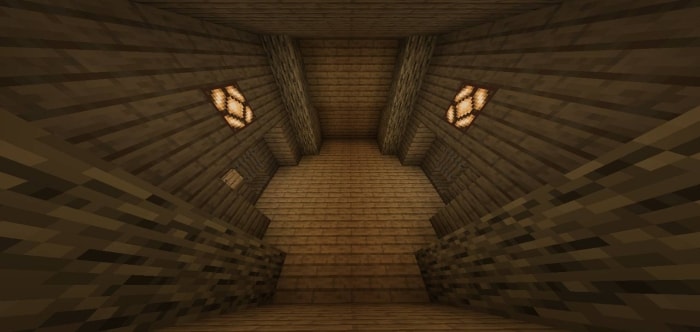 Wooden bunker hallway with ceiling lights
