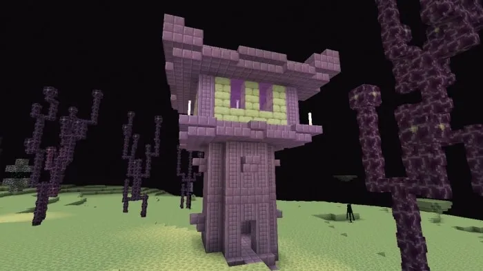 Purple tower structure in a barren landscape.