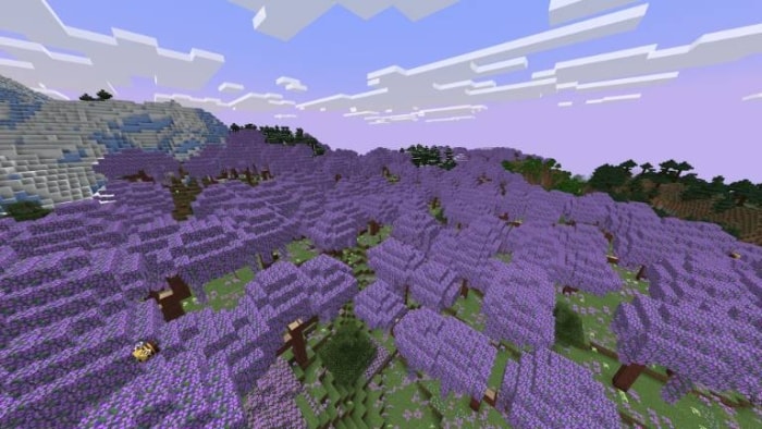 Purple forest biome with snowy mountain.