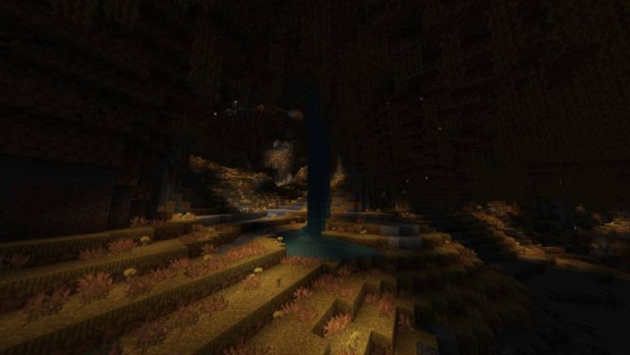 Dimly lit underground cave scene.