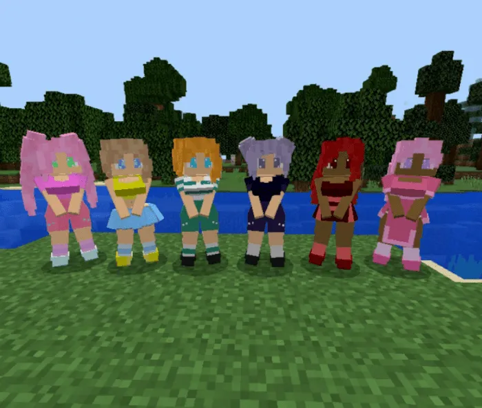 Colorful mermaids standing by the water.