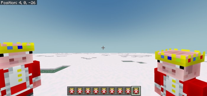 Two crowned pig totems on snowy ground
