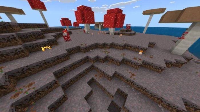 Mushroom biome with red and brown fungi.