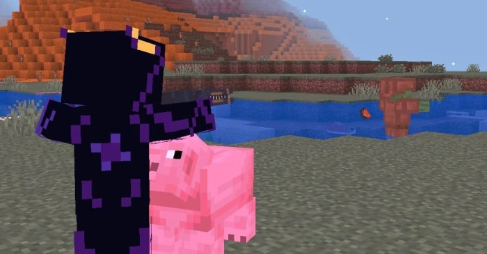 Player with gun next to a pink pig.