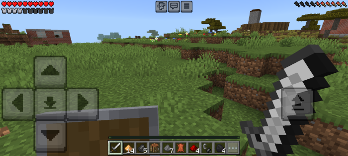 Player exploring grassy ruins with sword drawn