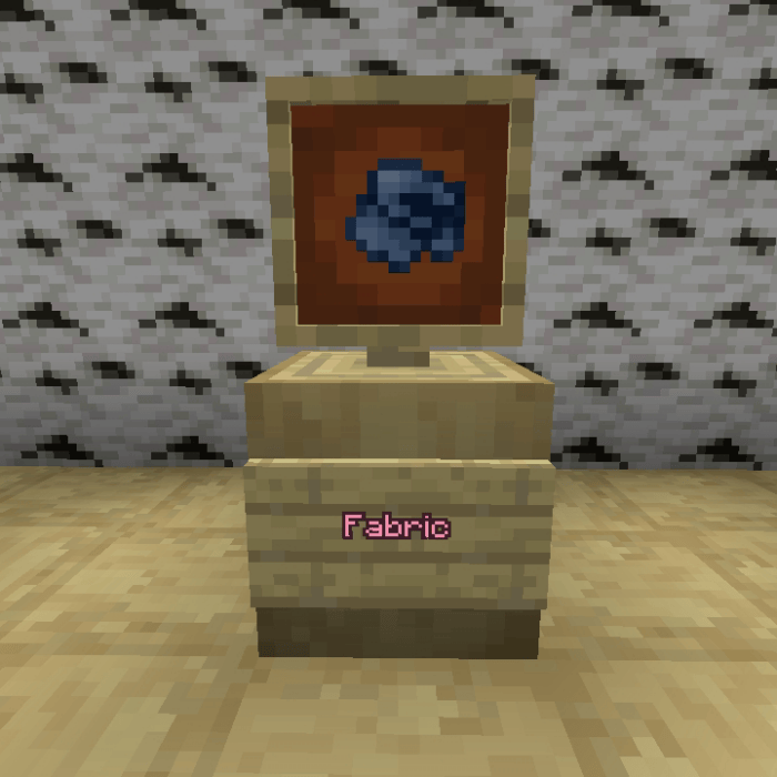 Item frame displaying blue fabric.