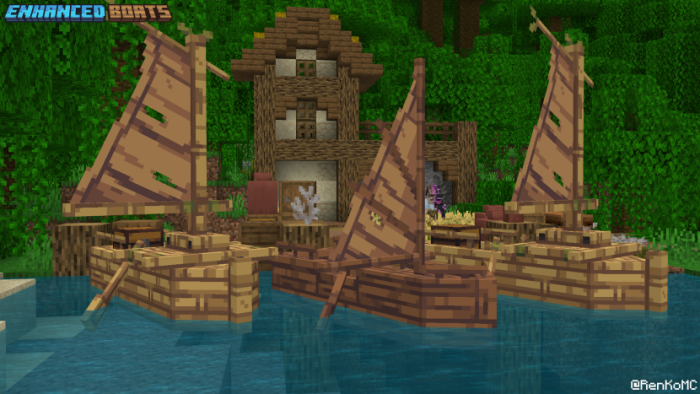 Sailboats docked by a wooden house.