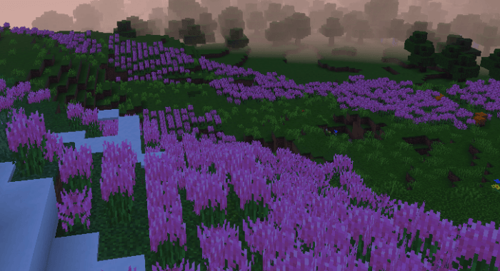 Purple flowers in a pixelated landscape.