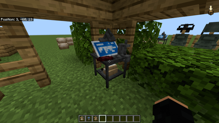 Workbench with weapons blueprint and tools