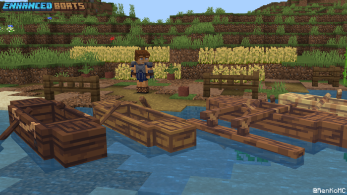 Various wooden boats on a riverbank.